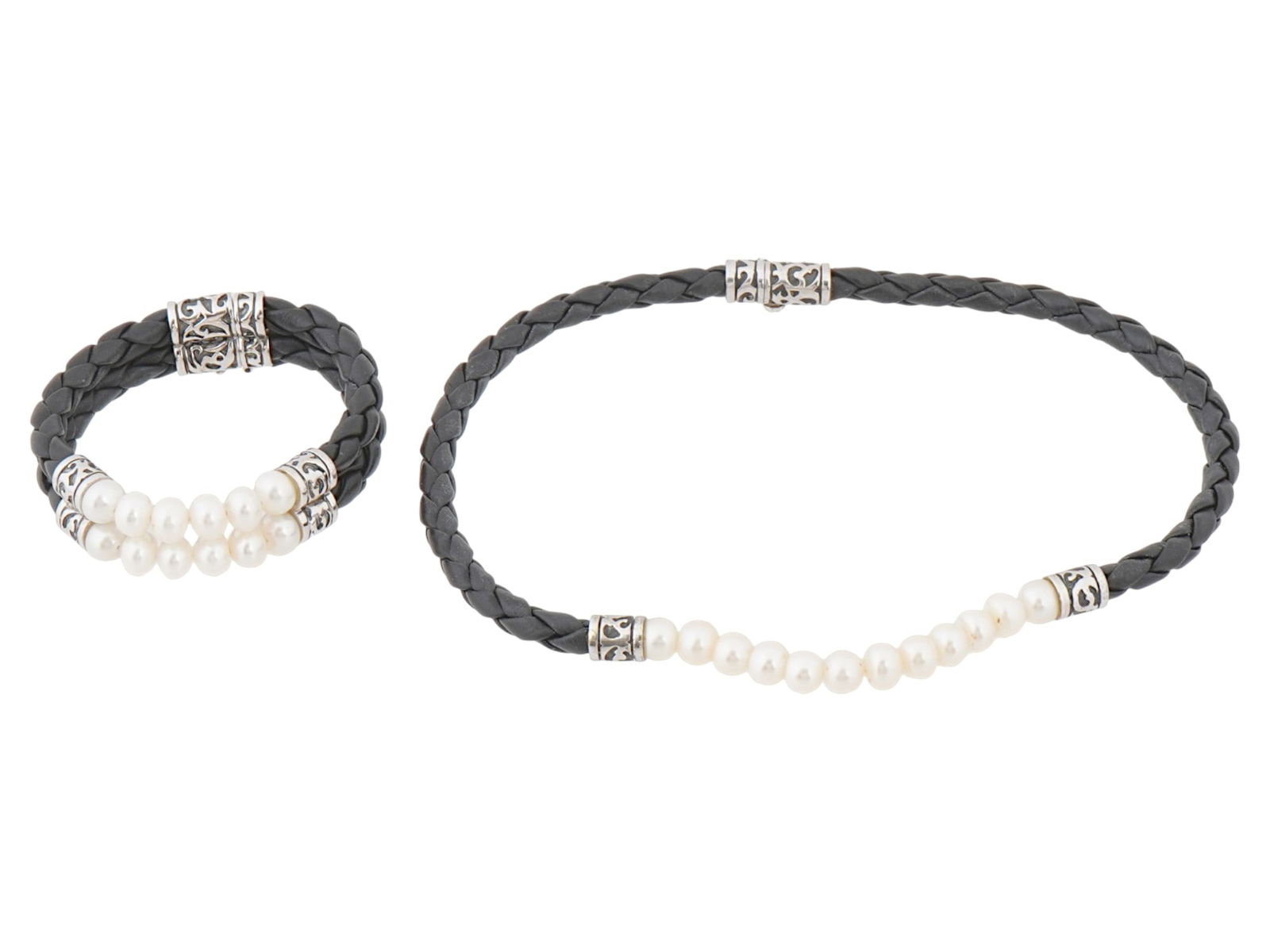 LEATHER PEARLS ST SILVER NECKLACE AND BRACELET SET: A choker necklace and bracelet set made of leather, pearls, and sterling silver. The set is designed in a single style and features braided black leather jewelry with pearls and engraved sterling silv