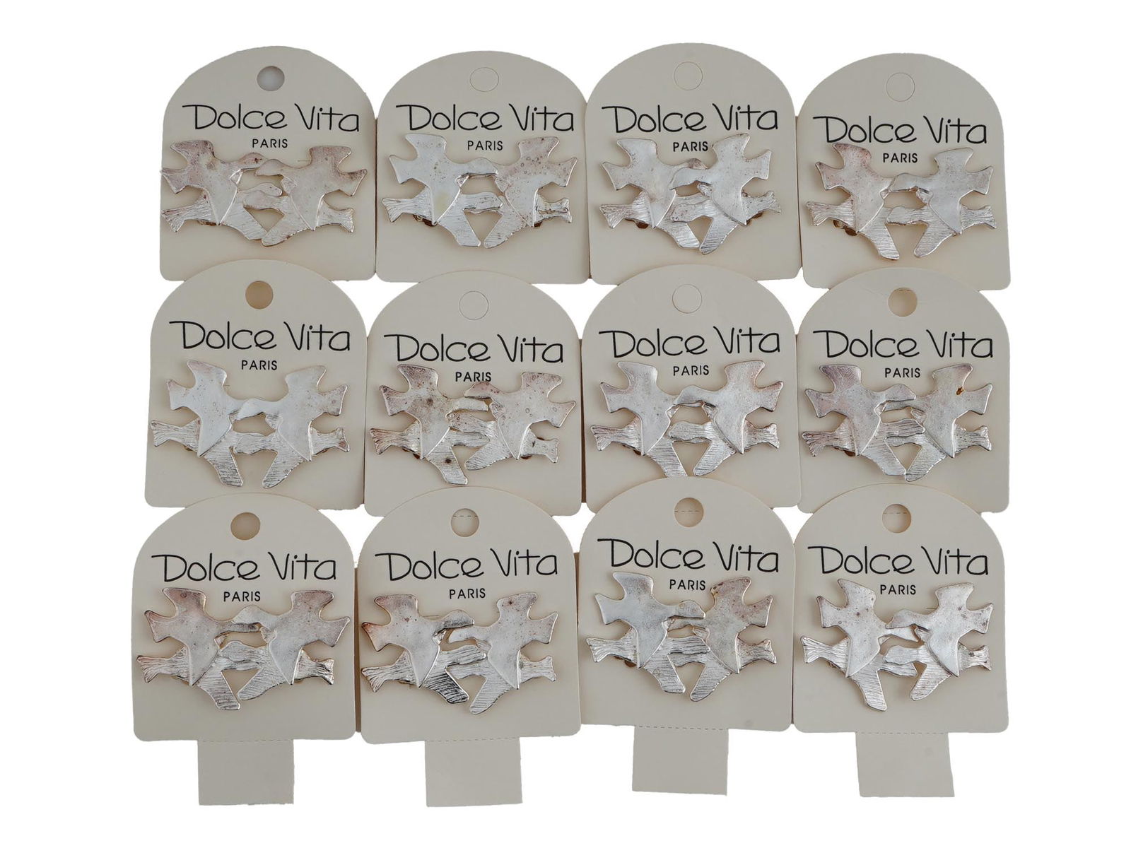 LOT OF 12 FRENCH DOLCE VITA COSTUME JEWELRY EARRINGS: A collection of twelve pairs of French Dolce Vita Paris costume jewelry earrings. Each ware is made in a figural design representing a pair of birds made in the Georges Braque manner. Each is marked w