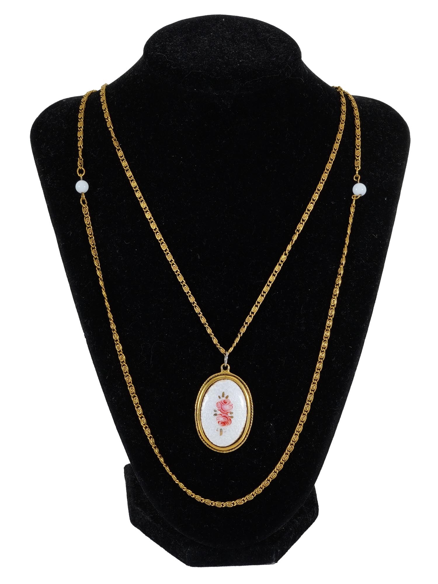 GOLDETTE DOUBLE STRAND NECKLACE W MEDALLION PENDANT: A vintage Goldette double strand gold tone necklace. The necklace is made in a chain design in the Victorian manner. The ware is adorned with a medallion pendant covered with Guilloche enamel and ador