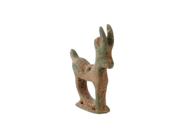 ANCIENT MESOPOTAMIAN BRONZE FIGURE OF A HORNED ANIMAL