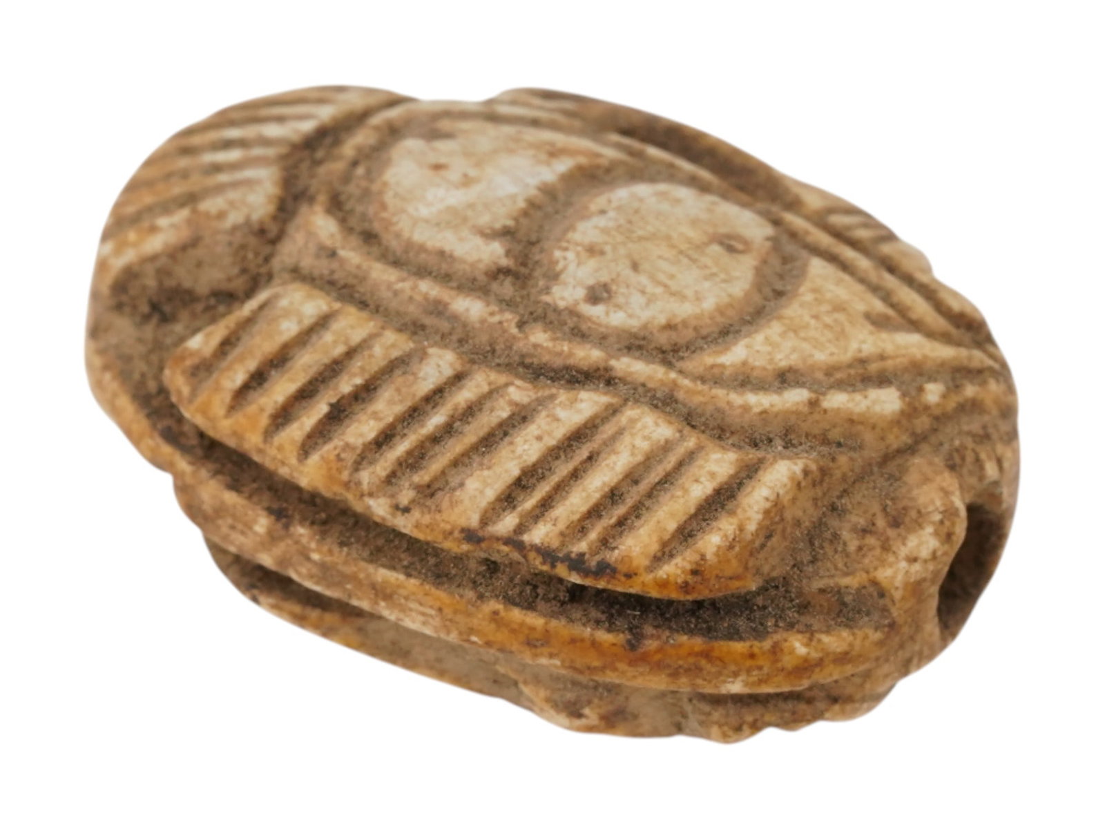 ANCIENT EGYPTIAN CARVED STONE HORUS EYE AMULET: An ancient Egyptian 18th Dynasty carved stone figural amulet depicting Eye of Horus on both sides, engraved with detailed patterns. The Udjat Eye, also known as the Eye of Horus or the Eye of Ra, was 