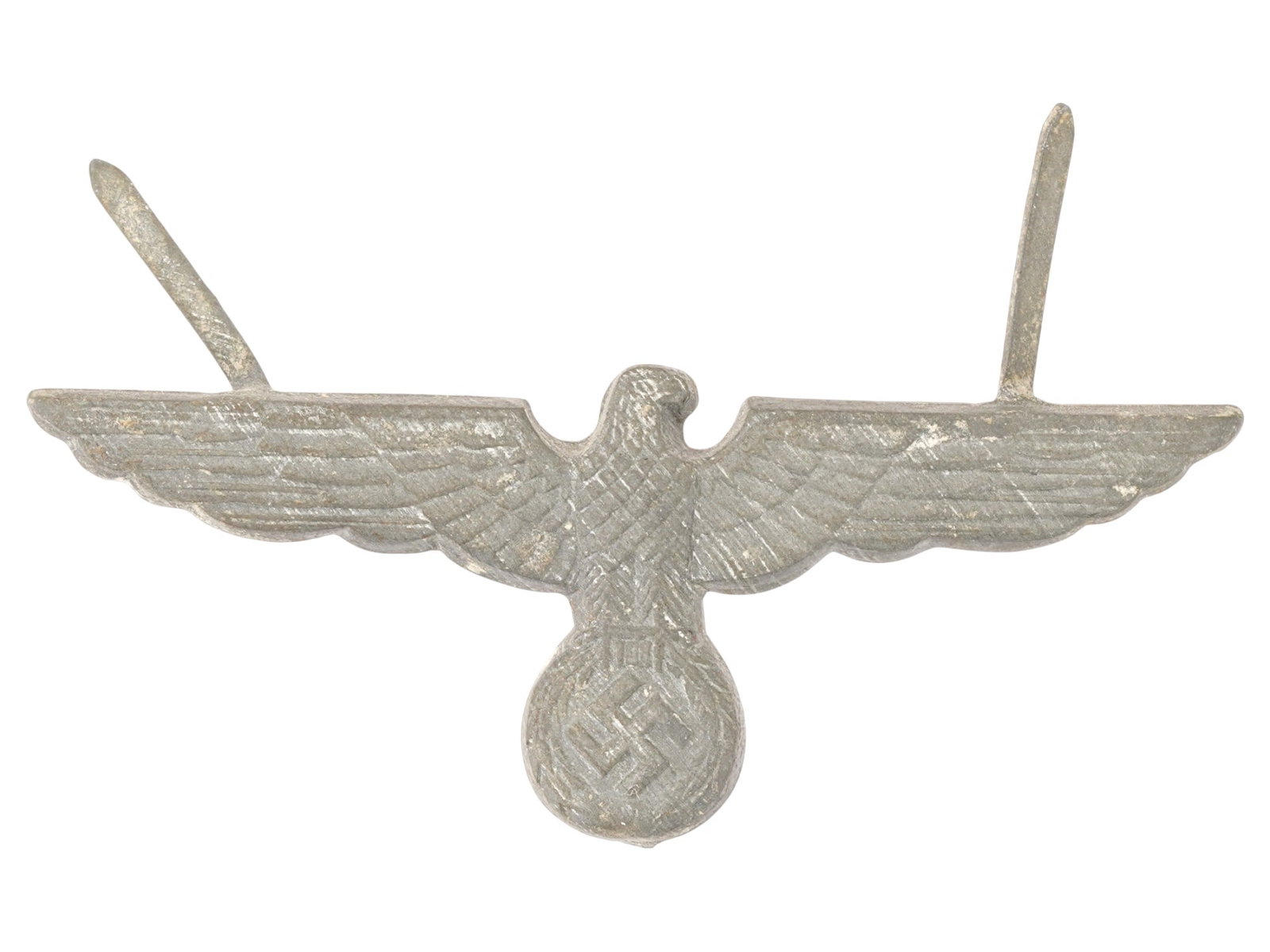 WWII NAZI GERMAN ARMY WEHRMACHT VISOR CAP BADGE: A WWII Nazi German Army Wehrmacht Heer metal visor cap badge featuring an image of a Nazi eagle clutching a swastika insignia. Second World War Nazi German Third Reich Medals, Badges, Military and His