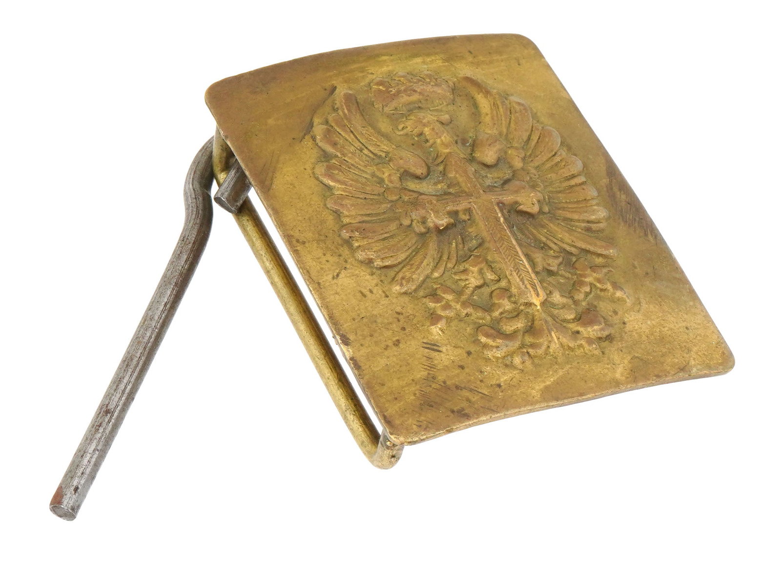 WWII NAZI GERMAN MODEL CONDOR LEGION BELT BUCKLE: A WWII Nazi German model Condor Legion belt buckle. The buckle is adorned with a relief image of a Nazi eagle with crossed swords and a crown on the top. The Condor Legion was a unit of military perso