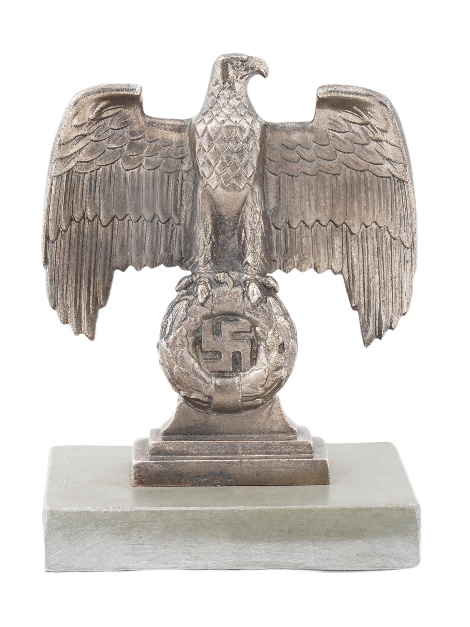 WWII NAZI GERMAN NUREMBERG EAGLE PATRIOTIC BUST: A WWII Nazi German Nuremberg Eagle Patriotic Bust. These busts typically feature the German eagle clutching a swastika, mounted on a pedestal or plinth, and were intended to symbolize loyalty, nationa
