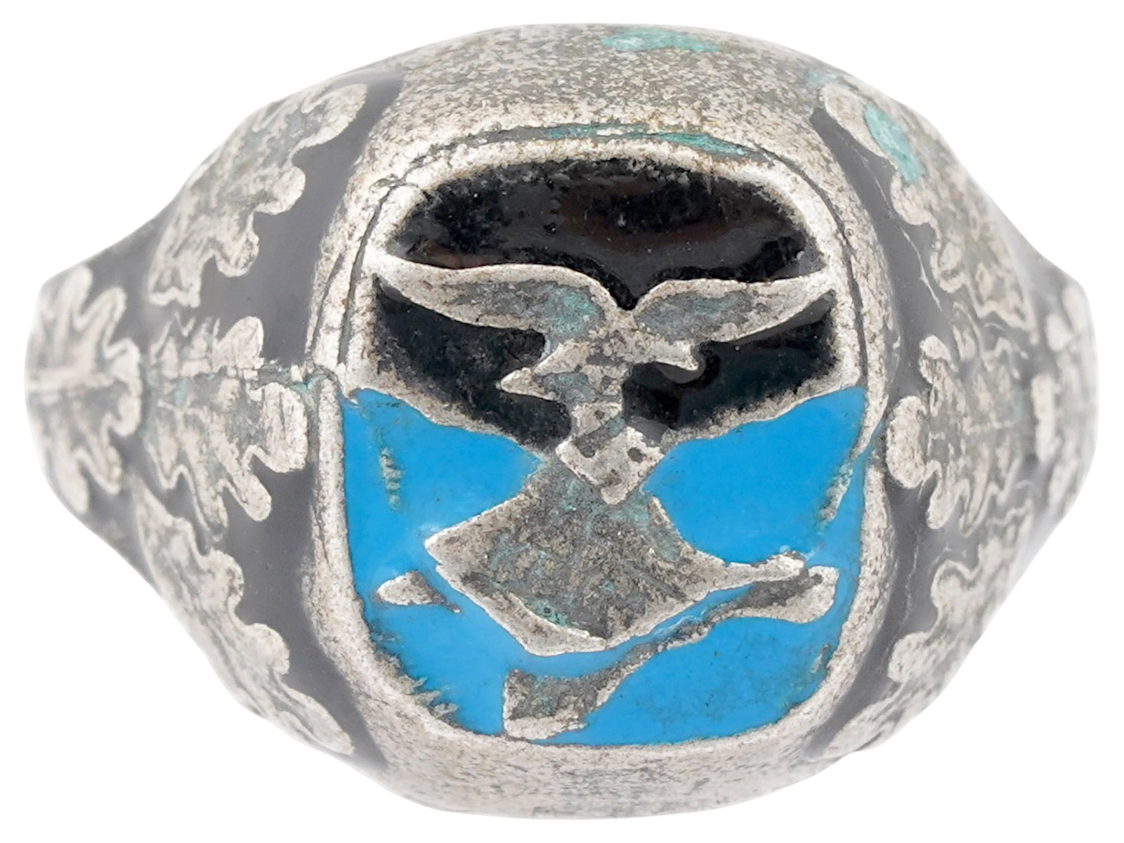 NAZI GERMAN WWII MODEL LUFTWAFFE PILOTS SILVER RING: A WWII model Nazi German Third Reich Luftwaffe Pilots silver ring. The ring is adorned with an engraved oak leaves pattern, covered with enamel in a black shade, and an image of a Nazi eagle holding a