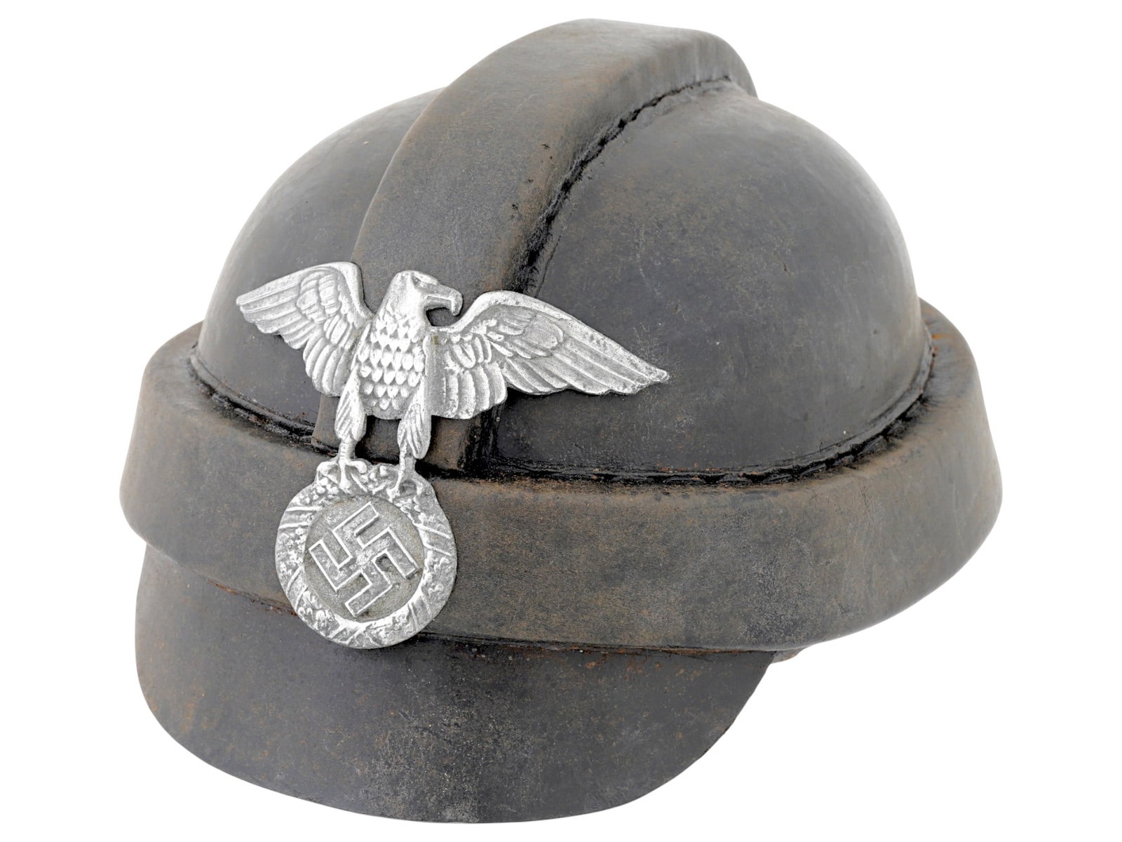WWII MODEL GERMAN NSKK MOTORCYCLISTS HELMET: A WWII model Nazi German NSKK motorcyclists helmet. Peaked black leather headwear with Reichsadler and swastika plaque on the front. Marked RZM, NSKK 1939 Reich, Karl Heisler Berlin on the inside. NSK