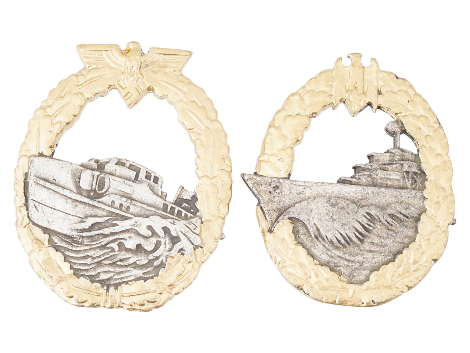 GROUP OF TWO WWII NAZI GERMAN KRIEGSMARINE BADGES: A group of two WWII Nazi German Kriegsmarine badges, including an E-Boat Badge and a Destroyer War Badge. The E-Boat badge features a high-speed torpedo boat in relief, surrounded by an oak leaf wreat