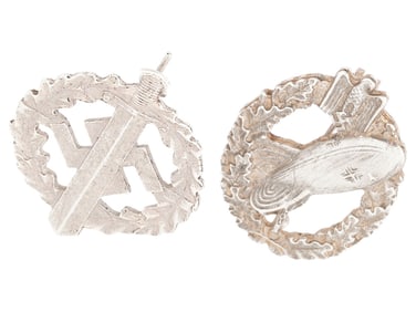 GROUP OF TWO WWII MODEL GERMAN MILITARY BADGES