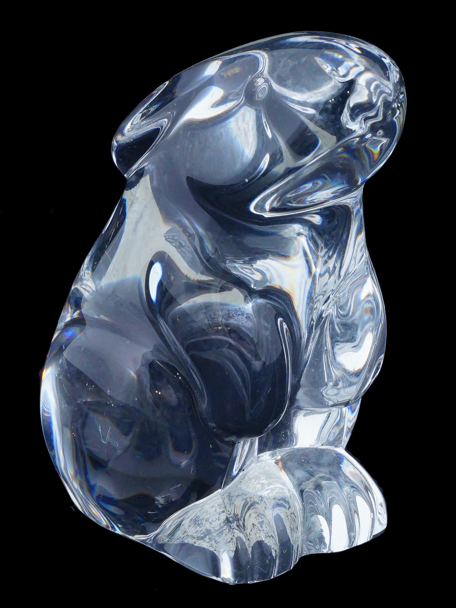 FRENCH BACCARAT MANNER CRYSTAL GLASS RABBIT FIGURINE: A French Baccarat manner clear crystal glass figurine or paperweight. The ware represents a seated rabbit. Unmarked. Circa: late 20th century. Baccarat is a French luxury house and manufacturer of fin