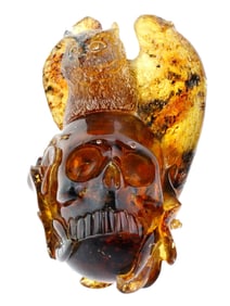 HAND CARVED NATURAL AMBER FIGURINE OF SKULL WITH OWL