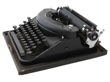 PORTABLE TYPEWRITER BY REMINGTON RAND