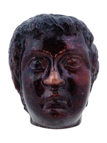 ANCIENT TRANSLUCENT BURGUNDY GLASS HEAD SCULPTURE