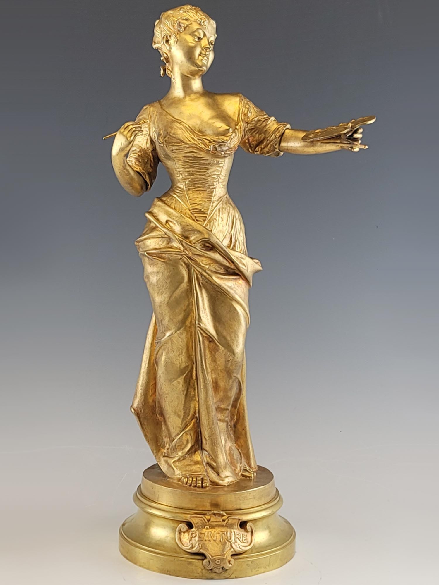 VICTOR ROUSSEAU BELGIAN 19TH C GILT BRONZE STATUE: An antique 19th century gilt bronze statue by Victor Rousseau, Belgium 1865 to 1954. The bronze statue of a young artist woman holding an artists palette and paint brushes. Titled on the front plaque: