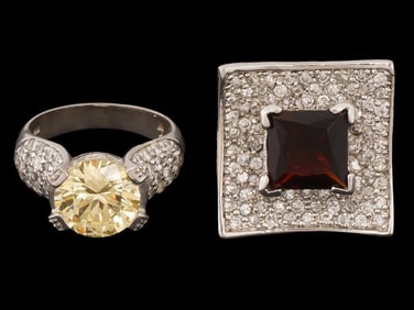 LOT OF TWO STERLING SILVER RINGS W GEMSTONES