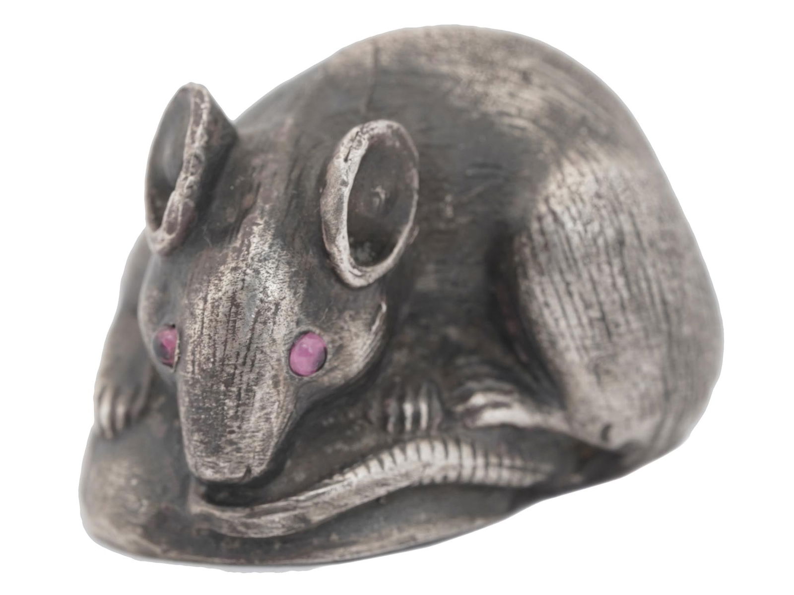 RUSSIAN SILVER FIGURINE OF A MOUSE WITH AMETHYSTS: A Russian 88 silver miniature figurine representing a mouse. The eyes of the figure are inset with amethyst cabochons. Hallmarks with silver standard and maker's intitials are under the feet of the mo