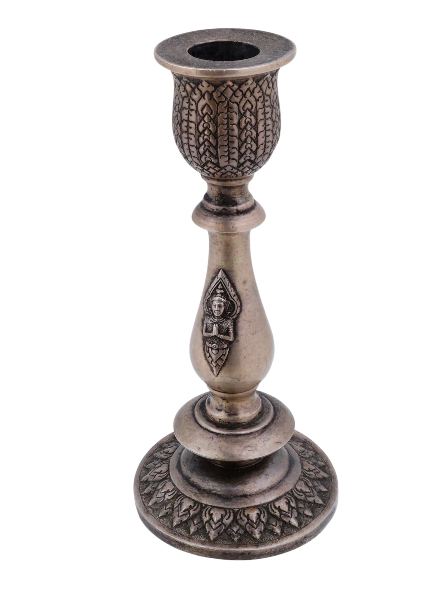 INDIAN HANDCRAFTED SILVER CANDLESTICK W APSARA: An Indian handcrafted silver candlestick. Shaped like a flower, it is richly decorated with traditional Southeast Asian foliate patterns. On both sides is an applied decor depicting a celestial apsara