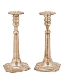 PAIR OF CARTIER WEIGHTED ST SILVER CANDLESTICKS