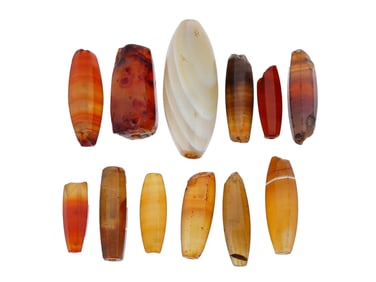 COLLECTION OF ANCIENT HAND CARVED AGATE STONE BEADS
