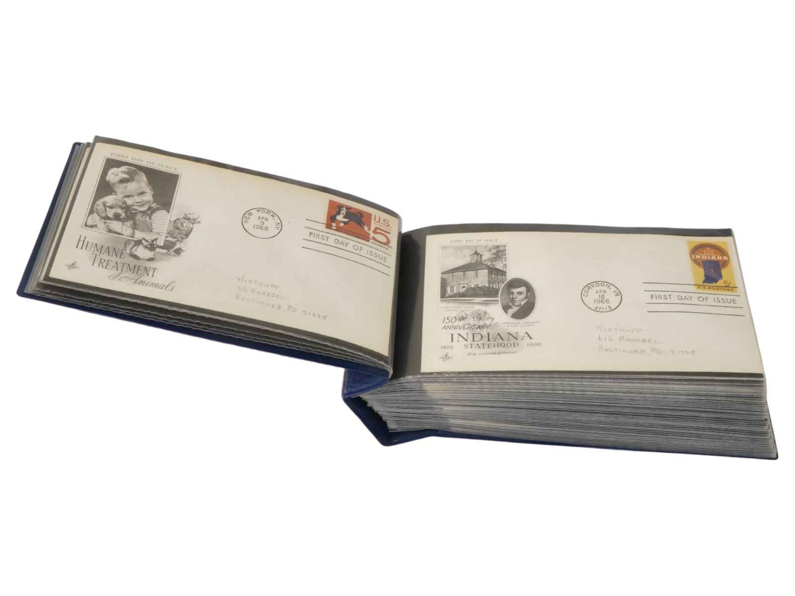ALBUM OF FIRST DAY OF ISSUE ENVELOPES F 1960S: A large lot of first-day-of-issue envelopes, collected in a hardcover album. The album features postal envelopes from the 1960s, featuring a variety of themes and stamped with a first-day-of-issue sta