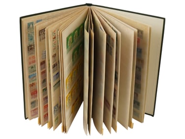 COLLECTION OF VINTAGE POSTAGE STAMPS IN ALBUM