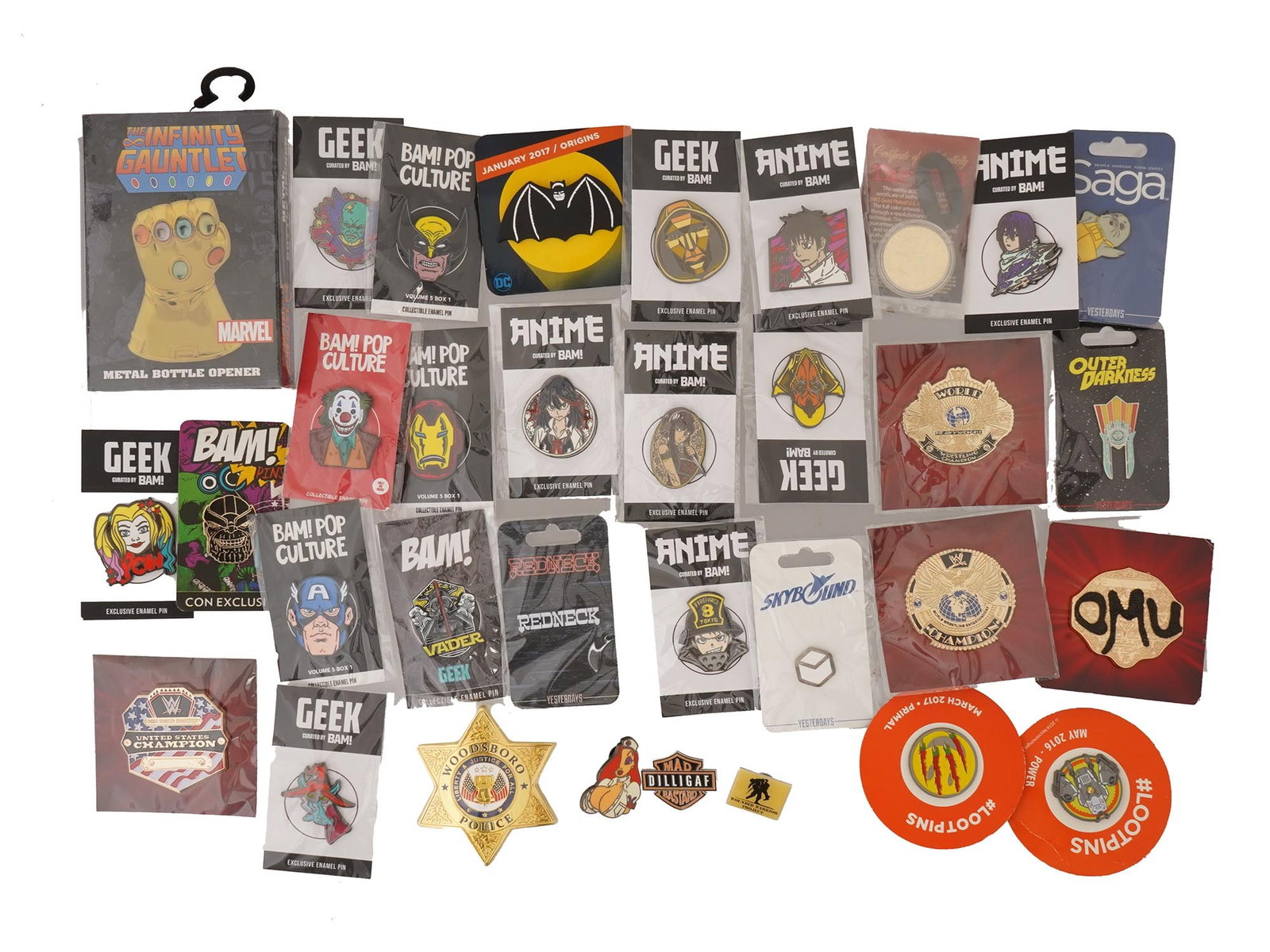 COLLECTION OF POP CULTURE AND ANIME ITEMS: A collection of pop culture and anime related items, including pins, patches, and other memorabilia. The items feature characters and themes from popular franchises such as Marvel, DC Comics, and vari