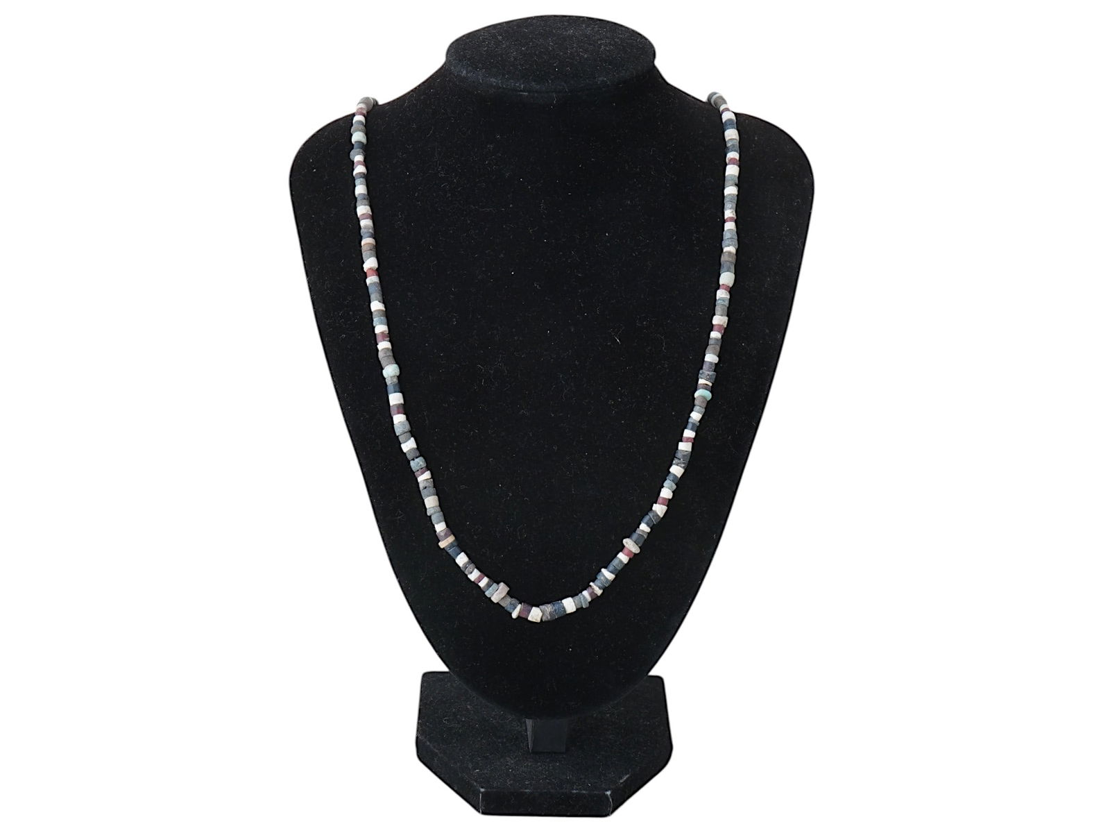 ANCIENT ROMAN LAPIS AND TURQUOISE BEAD NECKLACE: An ancient Roman necklace, strung with turquoise and lapis beads. Circa 100 to 300 AD. The beads are in varying shapes and sizes, featuring a mix of cylindrical and disc shaped pieces. Ancient Roman N