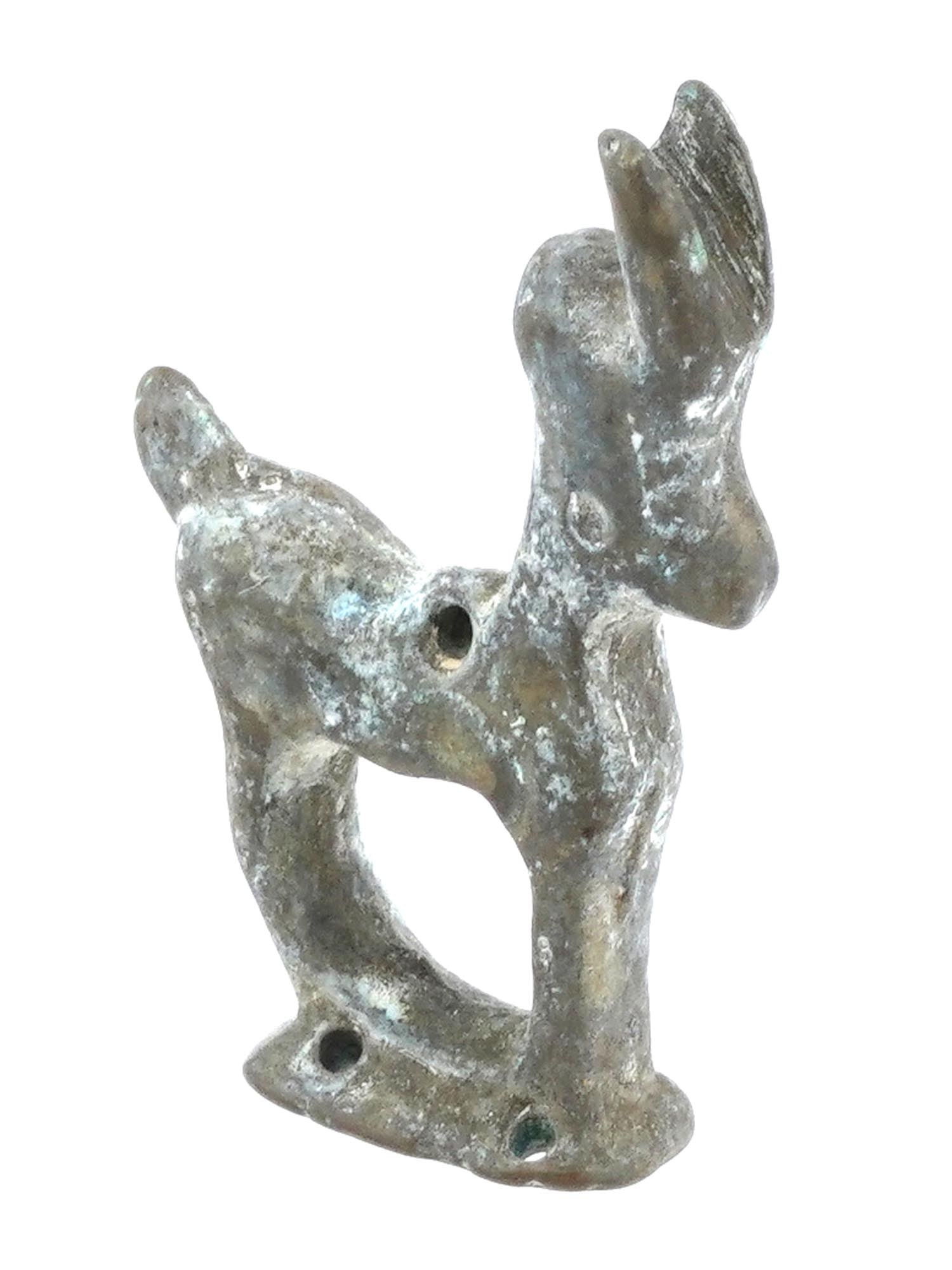 ANCIENT LURISTAN IRANIAN ART BRONZE DEER FIGURINE: An ancient Luristan bronze figurine of a deer, circa 600 to 400 BC. Showcasing the craftsmanship of early Iranian art. The deer is elegantly rendered, capturing its graceful form and dynamic posture,