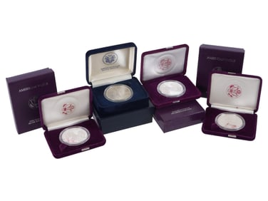 FOUR AMERICAN 1OZ FINE SILVER 1 DOLLAR COINS