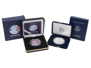 TWO AMERICAN PRESENTATION SILVER EAGLE BULLION COINS