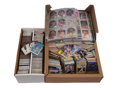 GROUP OF VINTAGE UNSORTED SPORTS TRADING CARDS IN BOXES