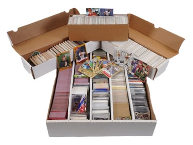 GROUP OF VINTAGE UNSORTED SPORTS TRADING CARDS IN BOXES