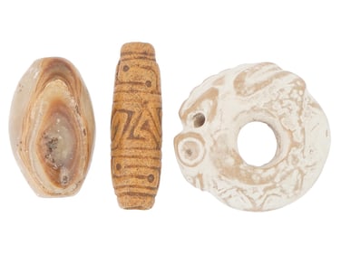 COLLECTION OF ANCIENT PRE COLUMBIAN CARVED STONE BEADS