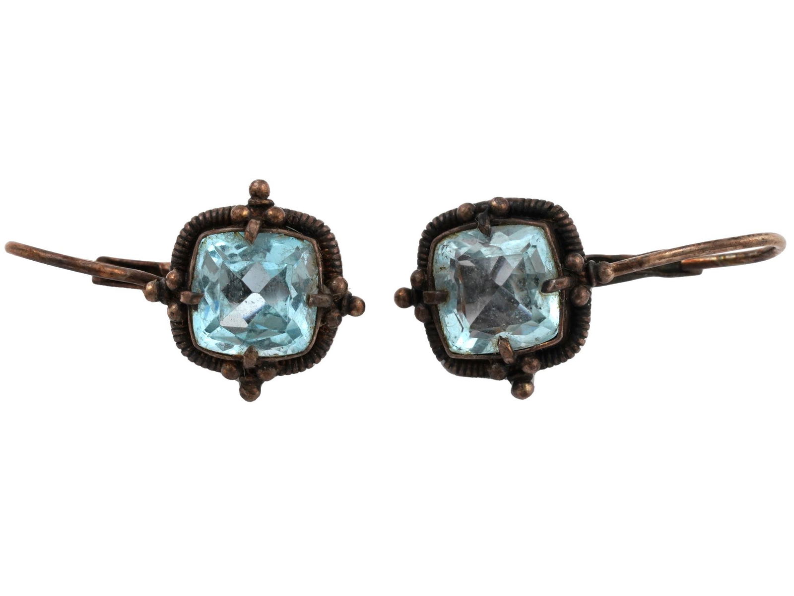 STERLING SILVER AQUAMARINE STONE JEWELRY EARRINGS: A pair of Sterling Silver jewelry earrings. The earrings are encrusted with an Aquamarine stone and made in the Edwardian manner. marked with a 925 standard Silver hallmark, on the backside. Total wei