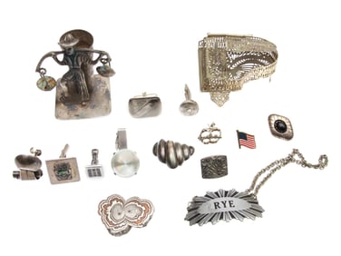 A VINTAGE SILVER JEWELRY CUFFLINKS AND FIGURES