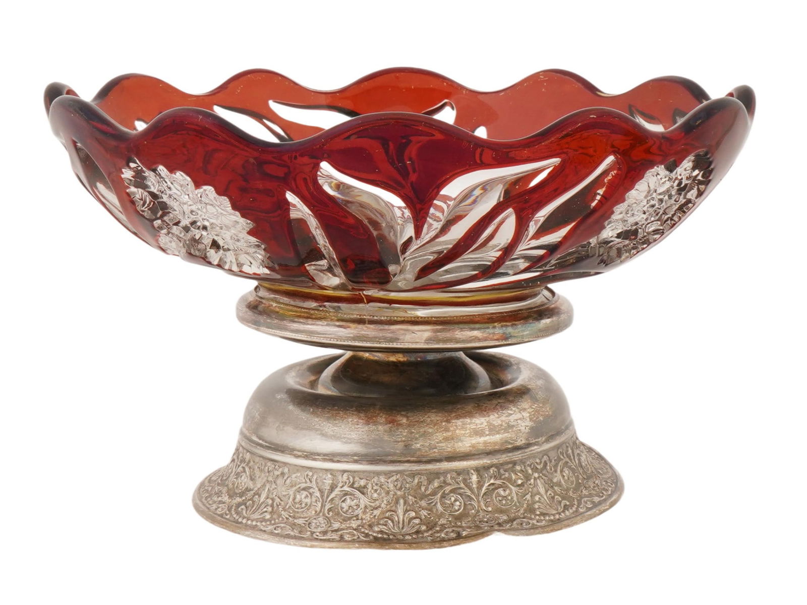 QUEEN CITY SILVER CO SILVER PLATED AND CRYSTAL BOWL: An early 20th-century American crystal fruit bowl with a silver-plated base by Queen City Silver Co. Inc. Red cut-to-clear glass, carnation flower motif. The base is embellished with chased ornaments.