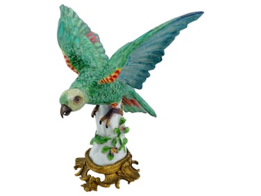 PORCELAIN PARROT FIGURINE ON GILDED BRONZE BASE