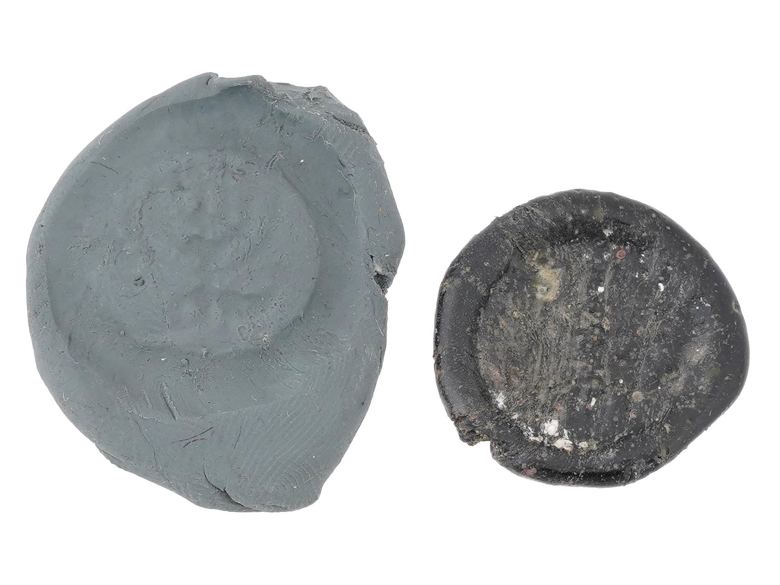 ANCIENT ROMAN GLASS MENORAH MEDALLION 100 TO 300 AD: An ancient Roman glass cameo medallion, circa 100 to 300 AD. Features an image of a menorah, a significant symbol in Jewish culture. The menorah, with its seven branches, represents light, wisdom, and