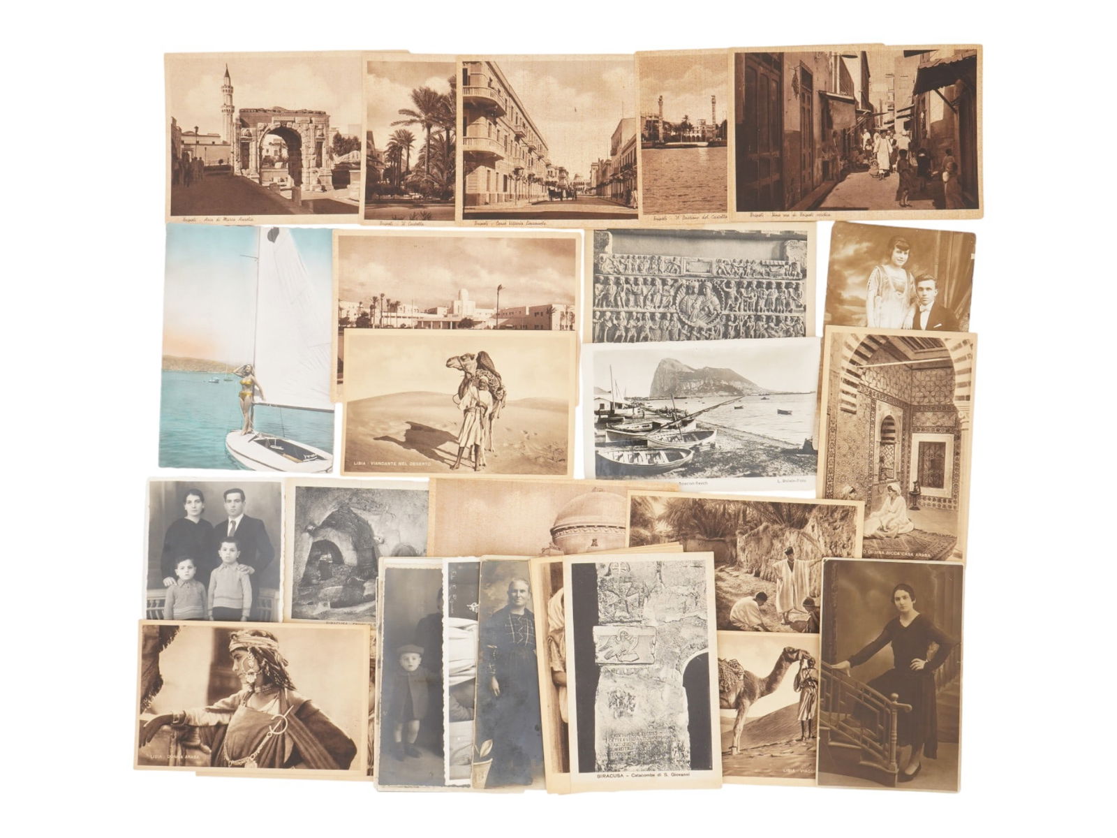 COLLECTION OF ANTIQUE PRINTED PHOTOS POSTCARDS: A collection of thirty four antique printed postcards. The postcards depict family group portraits, cabinet portraits, coastal seascapes, landscapes, architectural buildings, genre scenes and others.