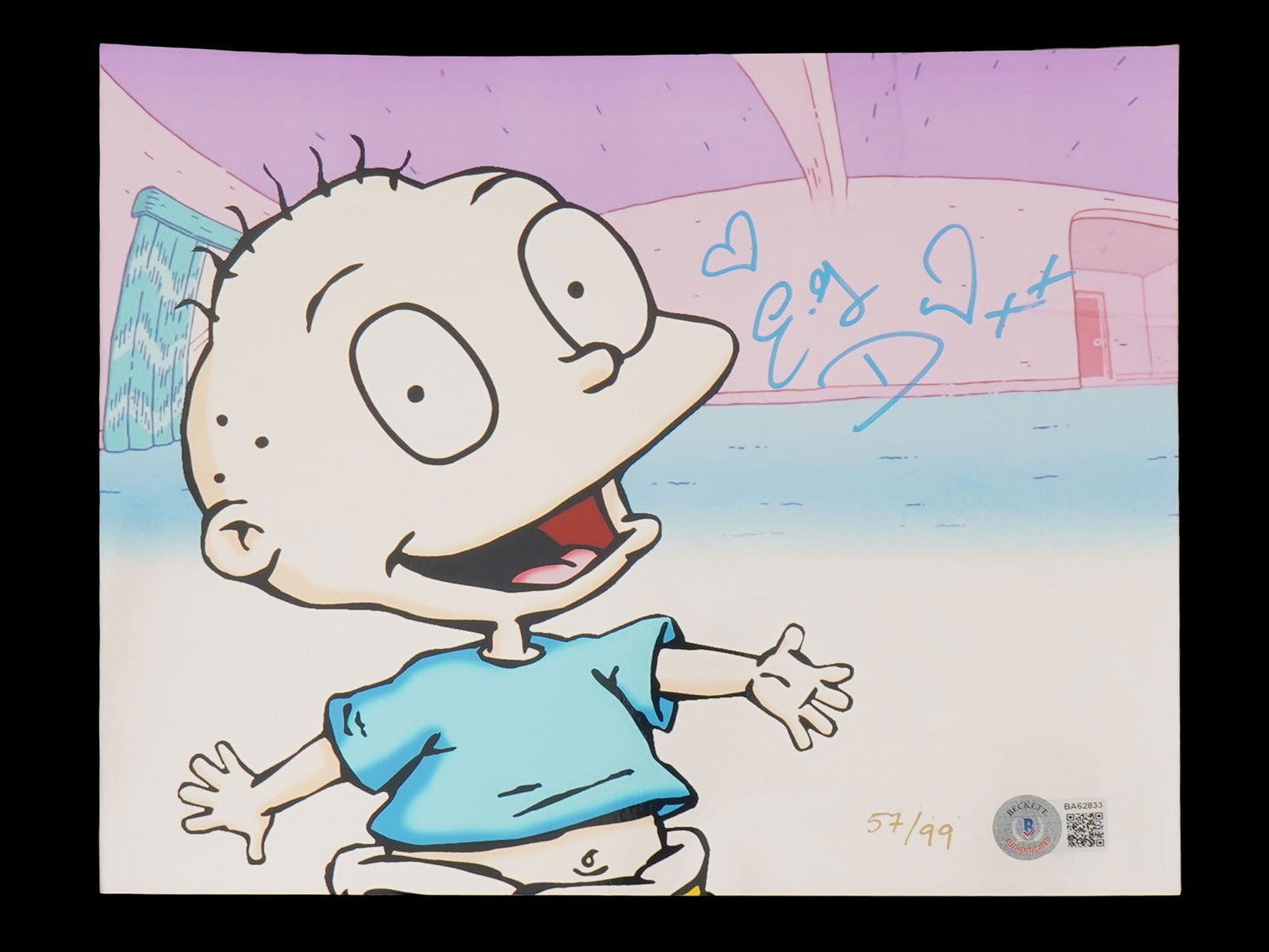 TOMMY PICKLES PRINT RUGRATS ELIZABETH DAILY AUTOGRAPHED: An autographed print featuring Tommy Pickles, the beloved protagonist of the Nickelodeon animated series Rugrats. The autograph is by E.G. Daily Elizabeth Daily, the voice actress for Tommy since 1991