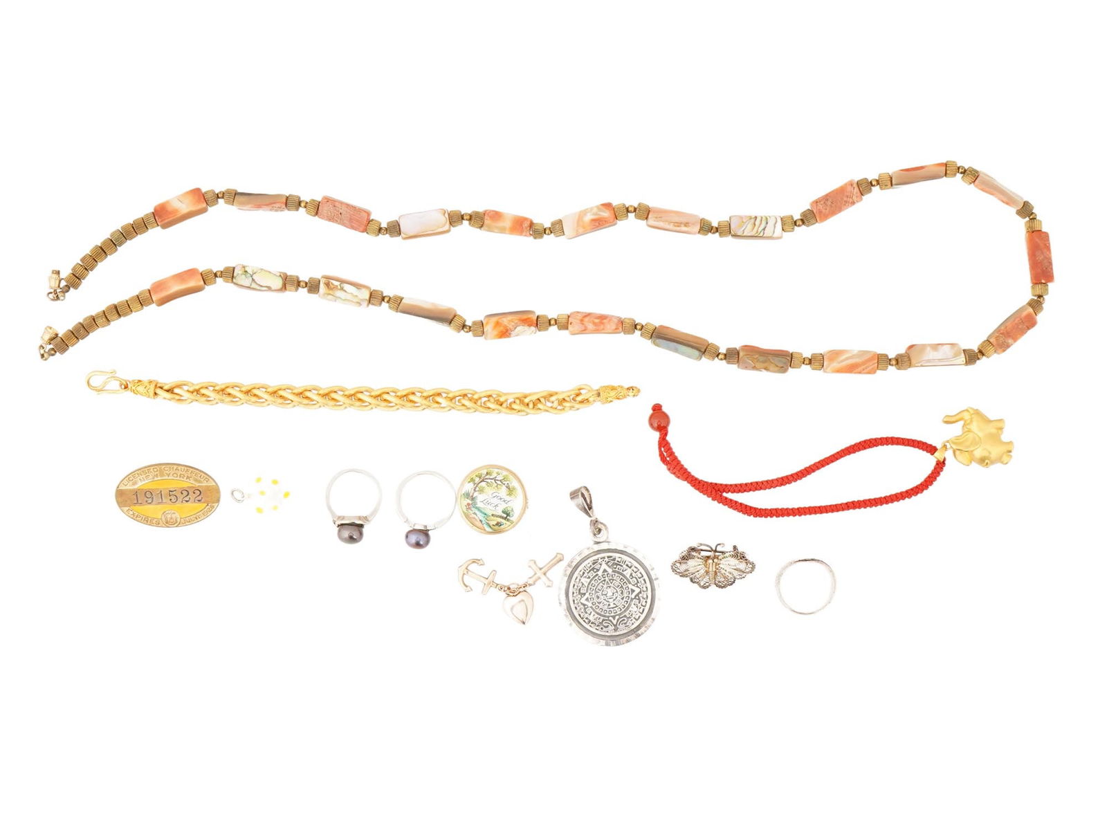 GROUP OF VINTAGE MIXED AND SILVER COSTUME JEWELRY: A group of vintage mixed costume jewelry, including silver. The lot includes silver rings, pendants, brooches, Chauffeurs License pin badge, bracelets, a necklace, Freshwater pearl rings, and bracelet