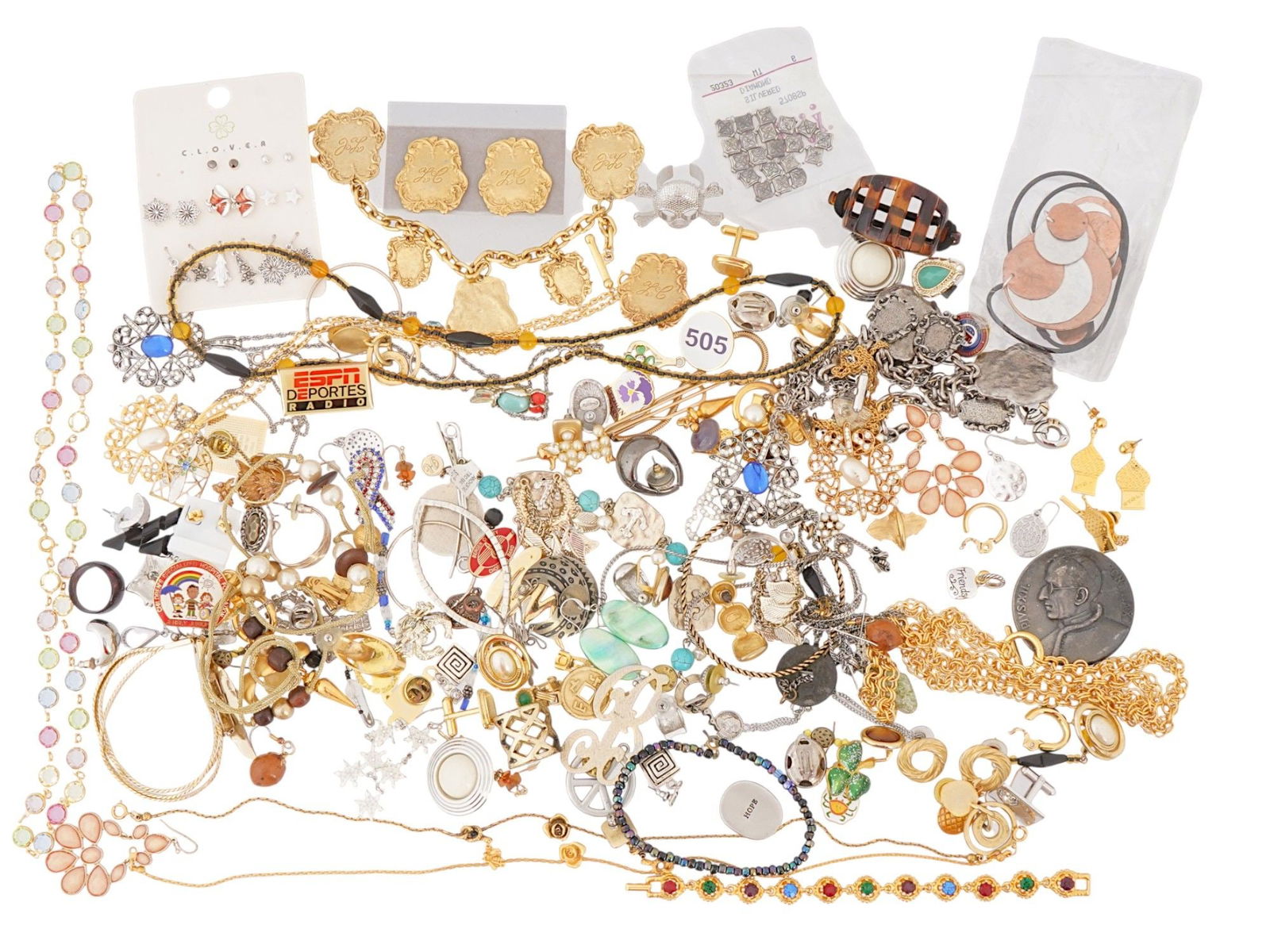 COLLECTION OF VARIOUS COSTUME JEWELRY: A collection of various costume jewelry made from a variety of materials, by different brand names, including rings, necklaces, brooches, earrings and more. Vintage Womens Brooches And Earrings And Je