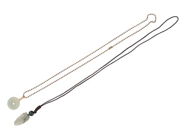 PAIR OF VINTAGE CARVED JADE NECKLACES