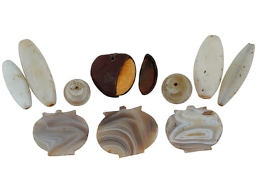 COLLECTION OF 9 ANCIENT BEADS AND NUT PENDANT 200 BC