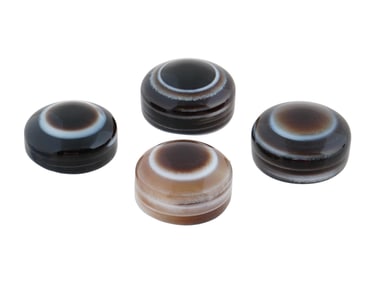 COLLECTION OF FOUR POLISHED EYE AGATE JEWELRY PENDANTS