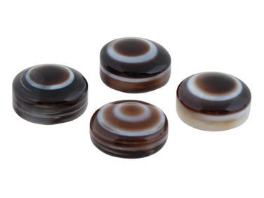 COLLECTION OF FOUR POLISHED EYE AGATE JEWELRY PENDANTS