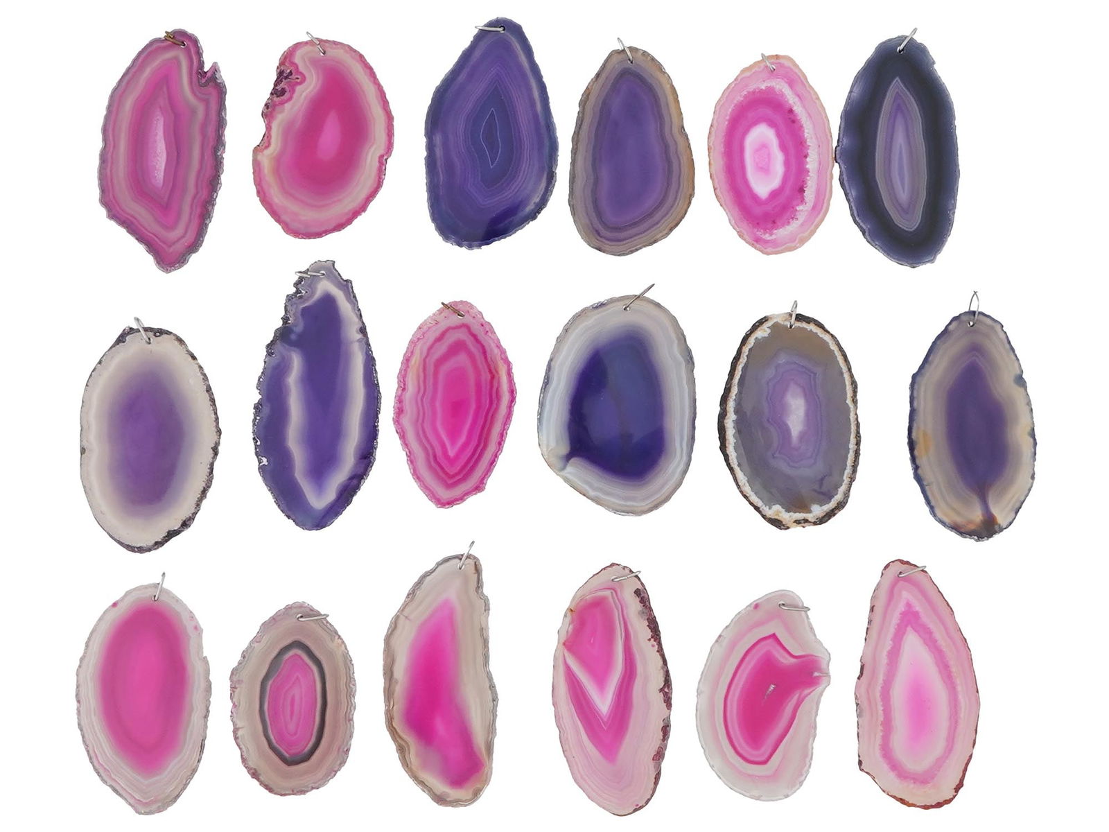 COLLECTION OF VARIOUS PINK PURPLE CARVED AGATE STONES: A collection of eighteen carved Agate stones in various sizes and shapes. The stones are presented in pink, purple, and white shades. Vintage Carved Mineral Stones, Jewelry Wares, and Collectibles.