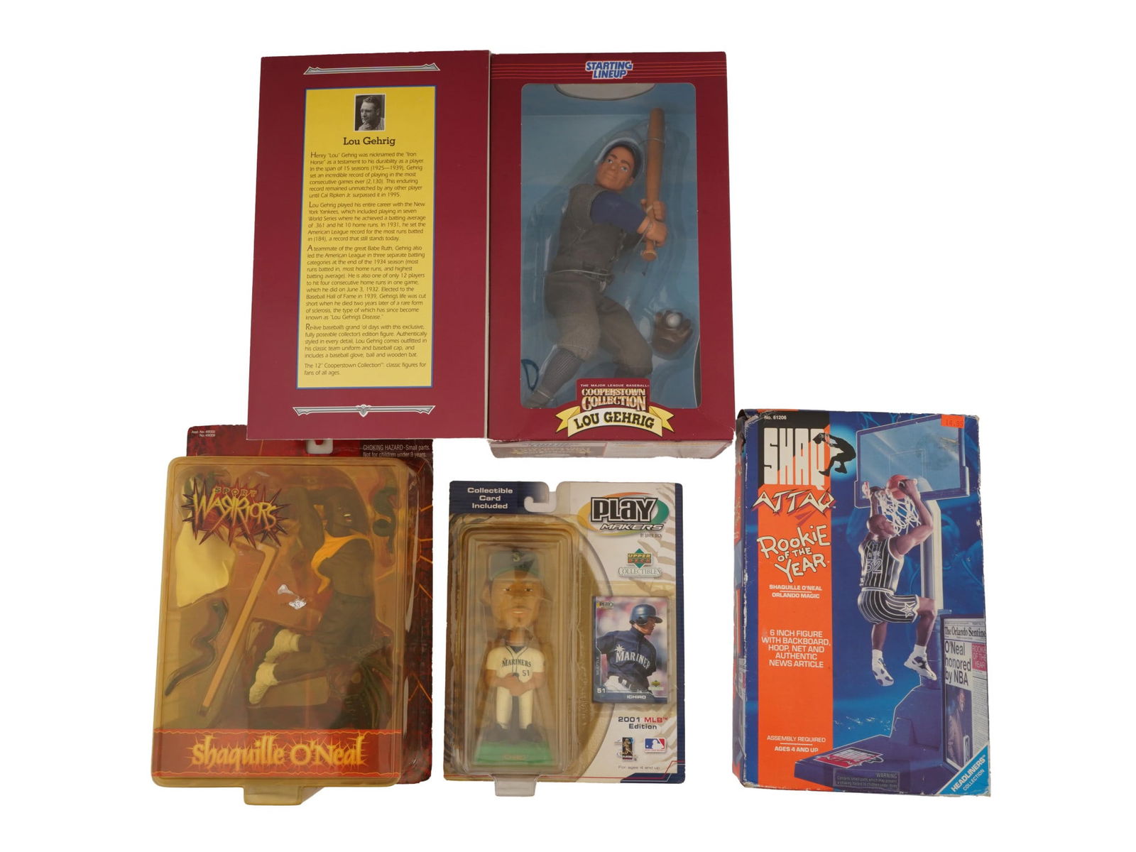 VINTAGE SPORTS ACTION FIGURES AND ATHLETE COLLECTIBLES: A collection of vintage sports action figures and collectibles, all presented in their original packaging, featuring iconic athletes from baseball and basketball. The group includes a 1996 Lou Gehrig