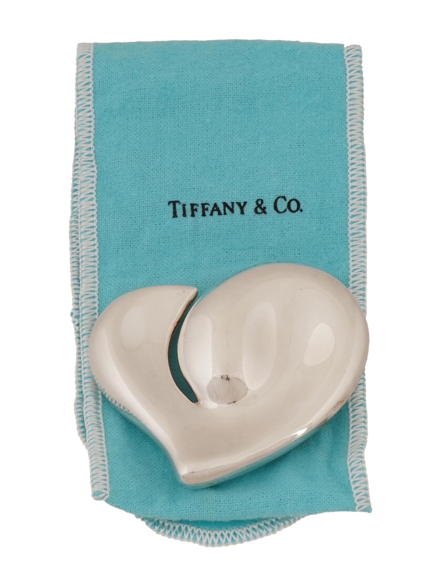 ELSA PERETTI FOR TIFFANY STERLING SILVER BELT BUCKLE: A sterling silver belt buckle by Tiffany and Co. Design by Elsa Peretti, 1940 to 2021, an Italian jewelry designer. Signature heart design. Marked Peretti, Tiffany and Co., Italy, 1978, Sterling, 925