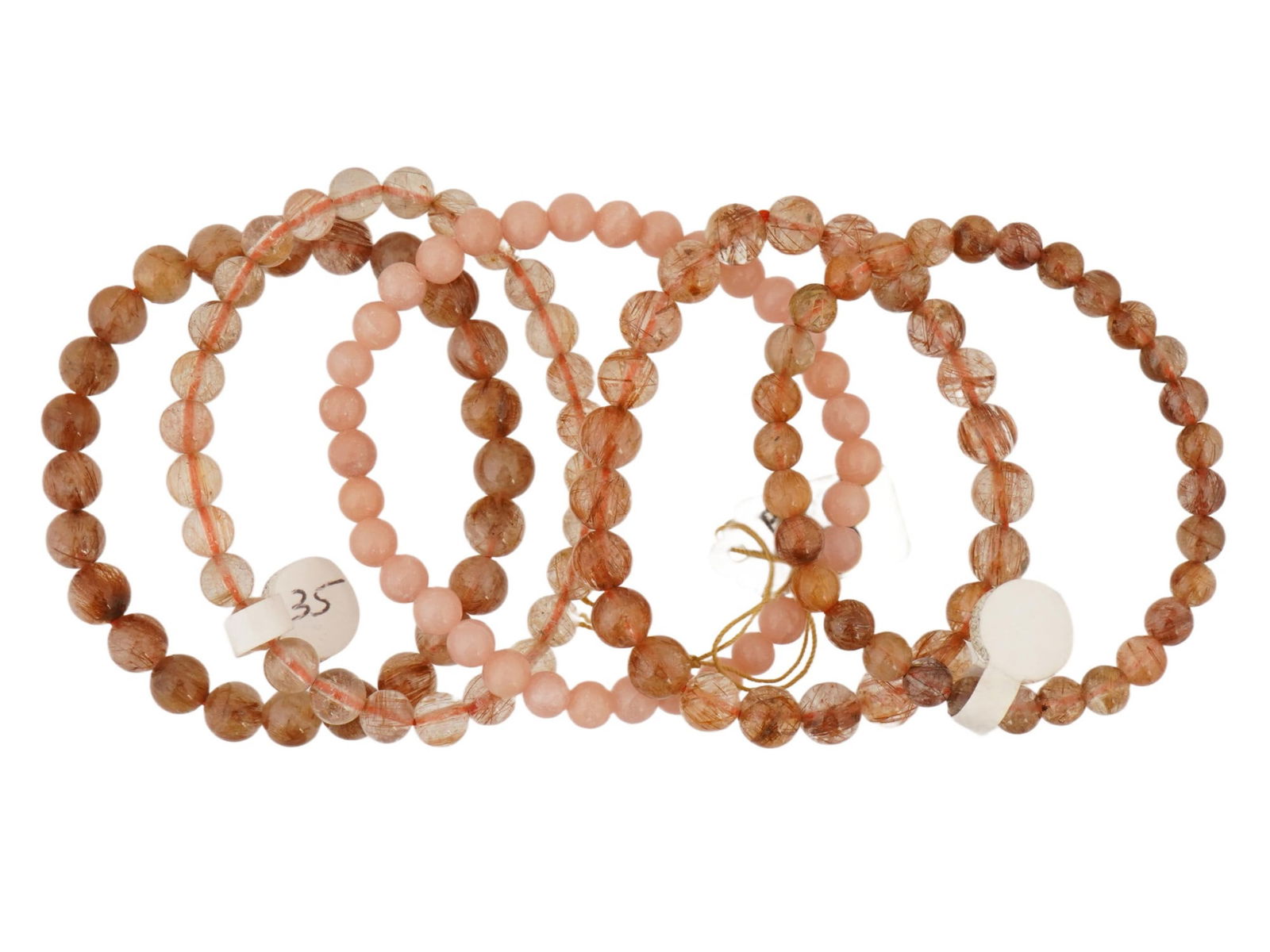 FIVE VINTAGE NATURAL STONE BEADED STRETCH BRACELETS: A set of five vintage natural stone beaded stretch bracelets, composed of polished round beads strung on elastic for a comfortable, flexible fit. Vintage Bracelets And Jewelry Collectibles. THI