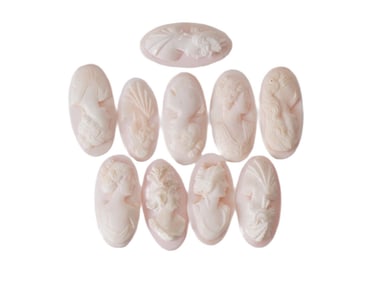 COLLECTION OF TEN HAND CARVED CORAL CAMEOS